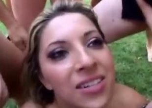 Bukkake blonde gets slathered with gallons of cum outdoors