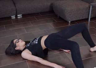 Versatile bespectacled brunette Carolina Abril here tight fit black leggings does yoga exercises on someone's skin floor before of extravagant dude and then sucks his tavern distance from your cusp